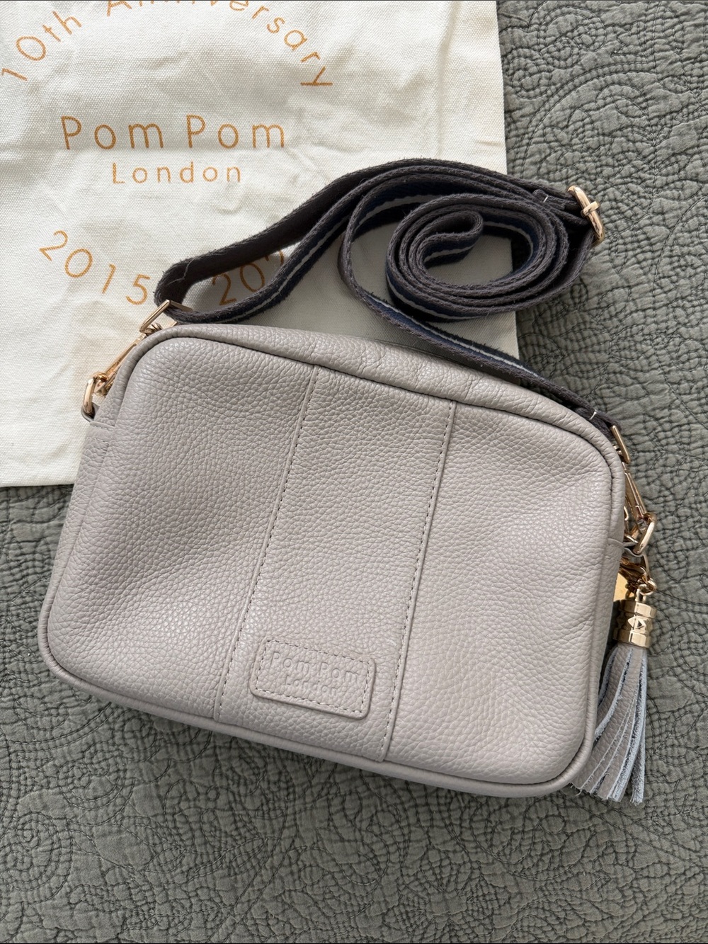 PomPom London Pebbled Leather City Crossbody Bag in stone